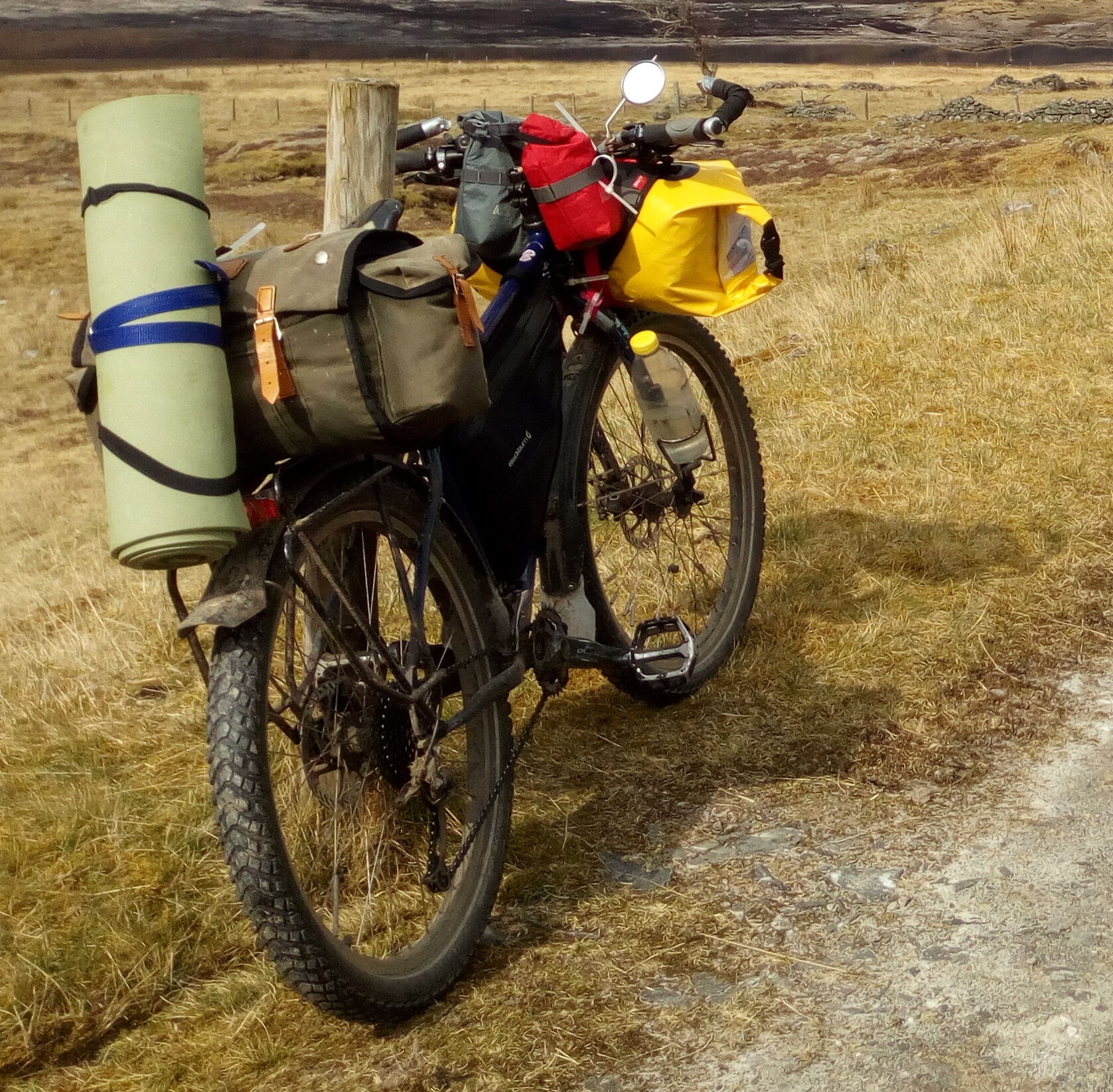 Bike with a saddle bag with mountains in the background