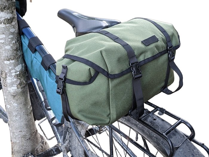 Saddlebag attached to the saddle on a pannier rack