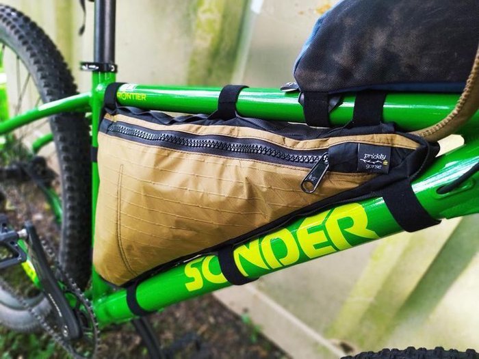 Photo of a custom made bike frame bag on a bike
